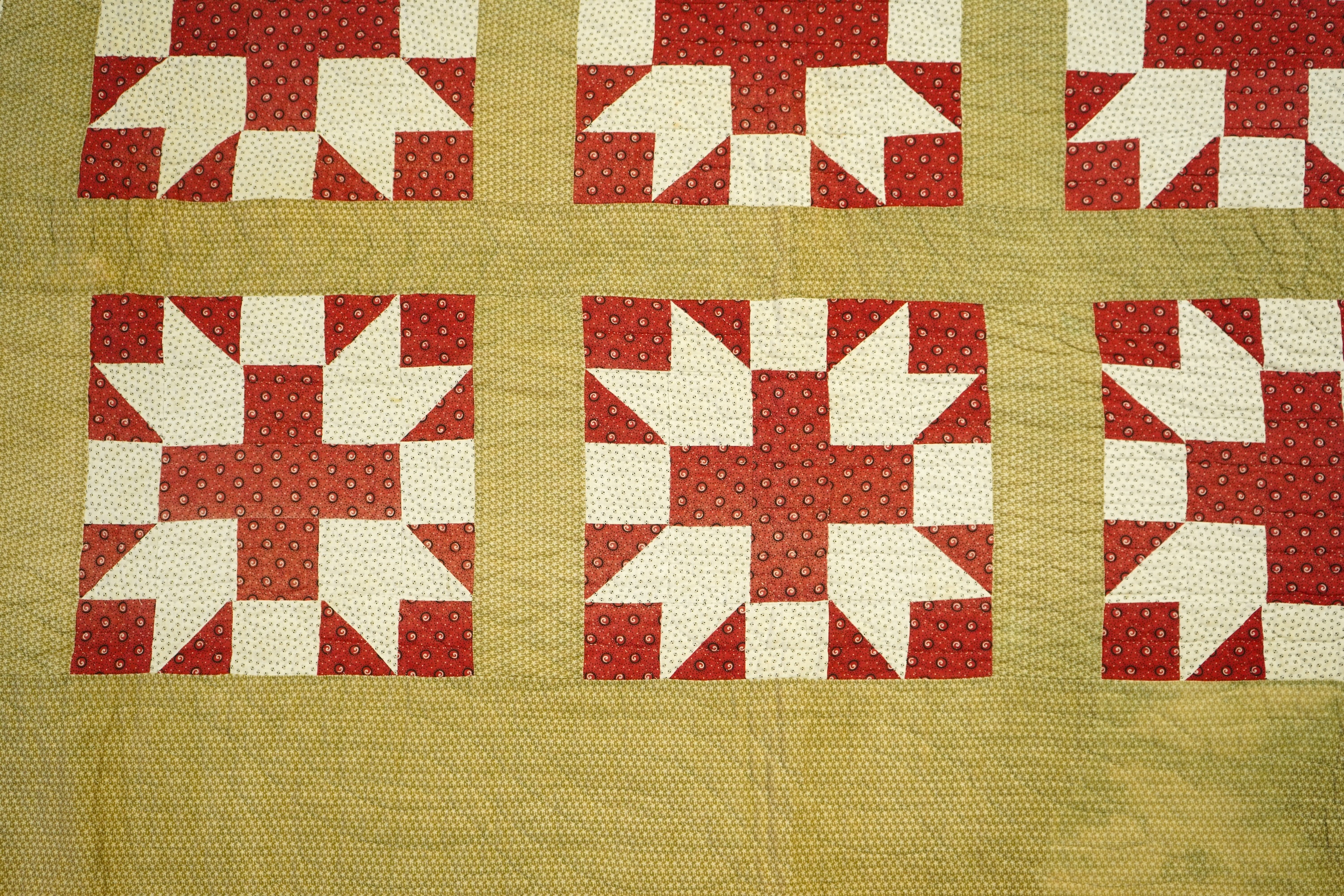 A late 19th century American, York County patchwork quilt, a similar pattern to Wild Goose Chase. Hand pieced and hand quilted, with label on reverse: York County Quilt documentation Project. G 53-2. The front worked in